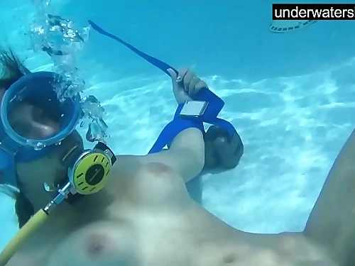 Candy being tongued underwater